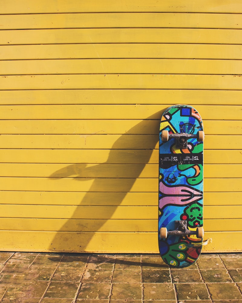 Skateboarder doing trick in bowl